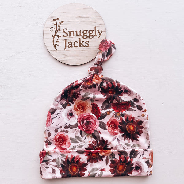 Snuggly Jacks canada knotted beanie in the blithe floral fabric