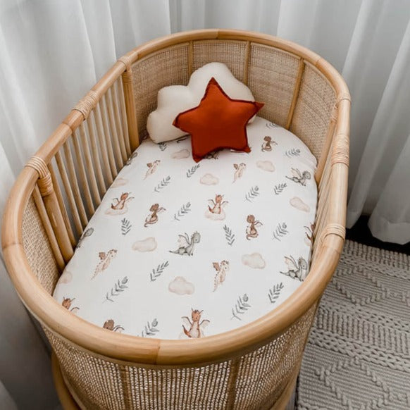 Rattan bassinet made up with the Mystique Bassinet Sheet / Change Pad Cover